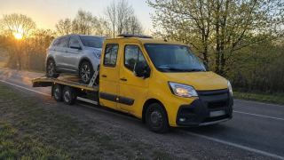 Laweta z SUV-em o wschodzie słońca – Lubin